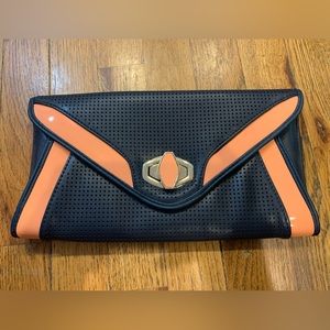 Women’s clutch. Switch level. Light coral/pink.